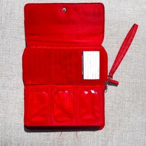 Supersized, red wristlet/ wallet.